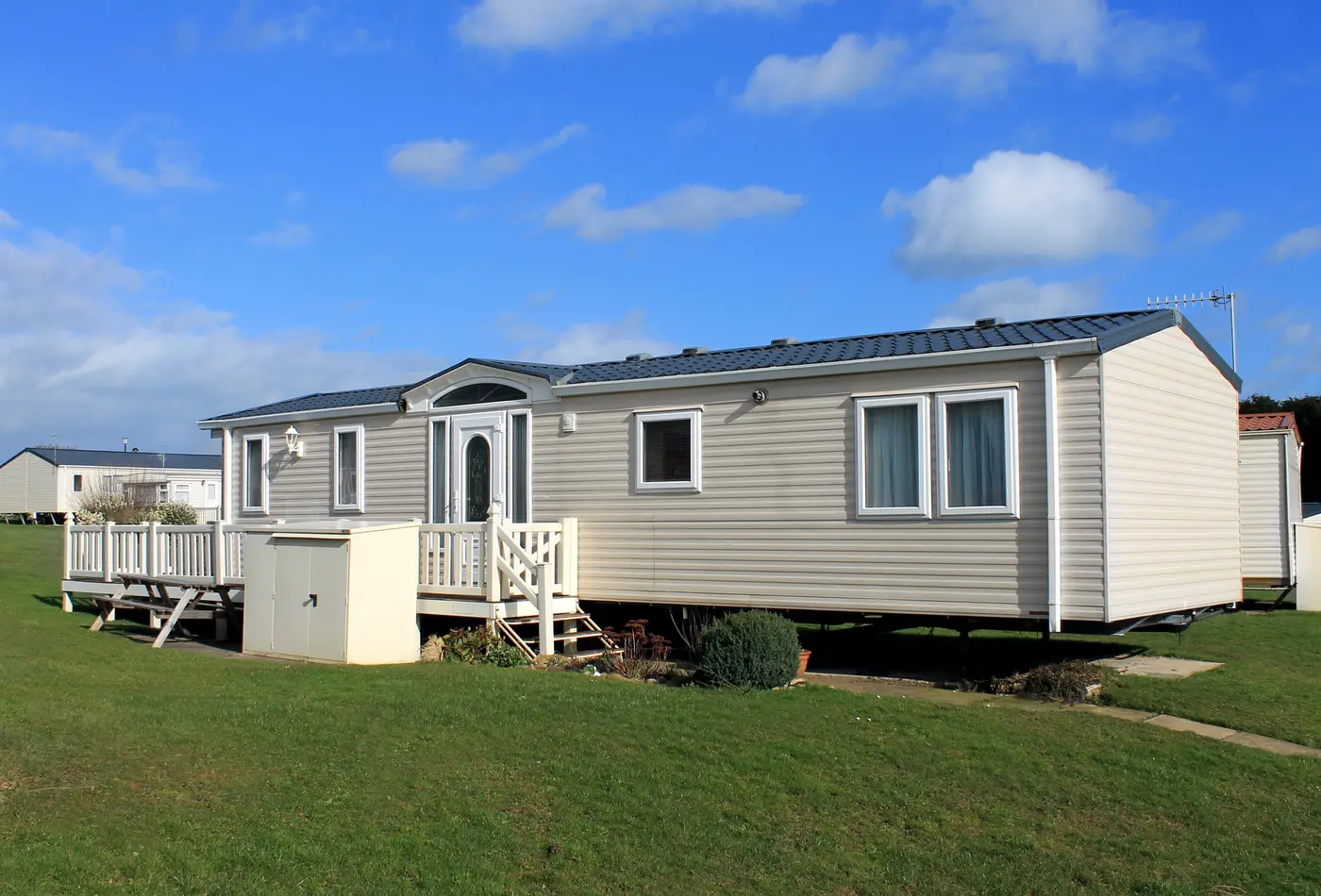 Cream caravan in trailer park